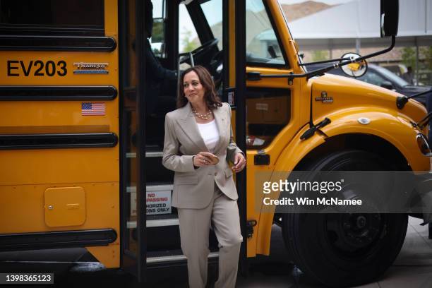 Vice President Kamala Harris steps off a new electric powered school bus while visiting Meridian High School May 20, 2022 in Falls Church, Virginia....