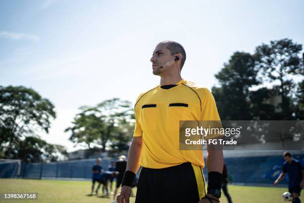 soccer referee at soccer field - referee uniform stock pictures, royalty-free photos & images