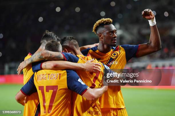Tammy Abraham of AS Roma celebrates with teammates after Lorenzo Pellegrini of AS Roma scored their side's third goal from the penalty spot during...