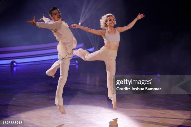 Janin Ullmann and Zsolt Sandor Cseke perform on stage during the final show of the 15th season of the television competition show "Let's Dance" at...