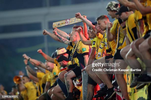 Fans of SG Dynamo Dresden show their support following their draw in the Second Bundesliga Playoffs Leg One match between 1. FC Kaiserslautern and...