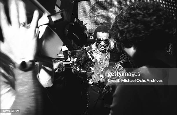 Sly Stone of the psychedelic soul group 'Sly And The Family Stone' performs on the TV show 'The Midnight Special' on December 17, 1976 in Burbank,...