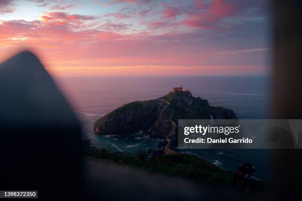 sunset in san juan de gaztelugatxe, setting of game of thrones, different frames, landscape photography - game of thrones scene stock pictures, royalty-free photos & images