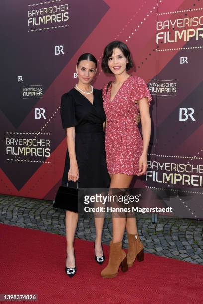 Nadine Menz and Jasmin Gassmann arrive for the Bayerischer Filmpreis 2022 at Prinzregententheater on May 20, 2022 in Munich, Germany.
