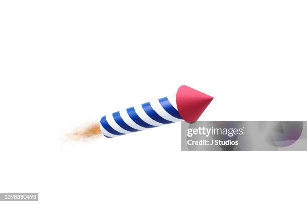 cut out of fireworks rocket with exhaust on an angle - firework rocket stock pictures, royalty-free photos & images