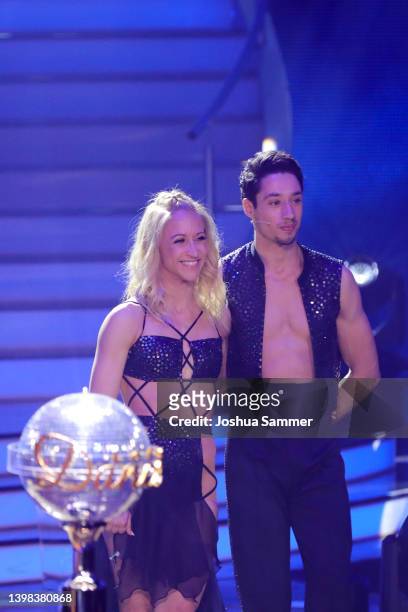 Finalists, Kathrin Menzinger and Rene Casselly wait on stage to hear the winning results for the final show of the 15th season of the television...