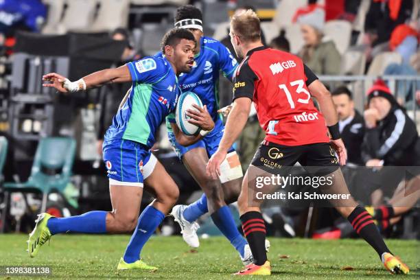 Ilaisa Droasese of Fijian Drua charges forward during the round 14 Super Rugby Pacific match between the Crusaders and the Fijian Drua at...