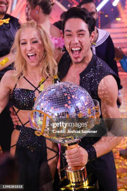 Kathrin Menzinger and Rene Casselly celebrate winning the final show of the 15th season of the television competition show "Let's Dance" at MMC...