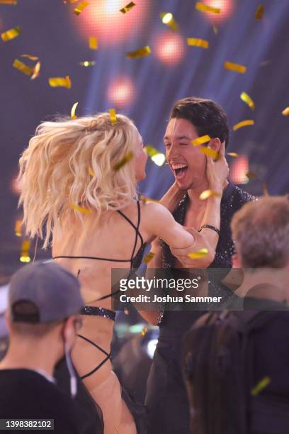 Kathrin Menzinger and Rene Casselly celebrate winning the final show of the 15th season of the television competition show "Let's Dance" at MMC...