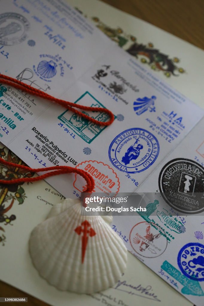 Pilgrim passport and display shell used while walking the Camino