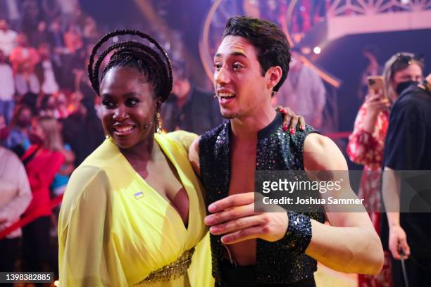 Rene Casselly celebrates with Motsi Mabuse after winning the final show of the 15th season of the television competition show "Let's Dance" at MMC...