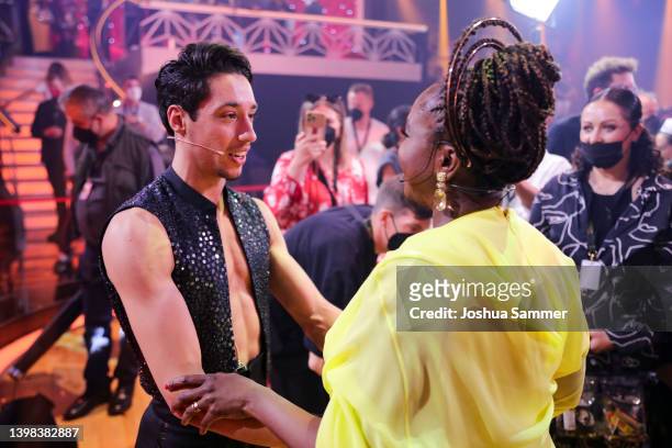Rene Casselly celebrates with Motsi Mabuse after winning the final show of the 15th season of the television competition show "Let's Dance" at MMC...