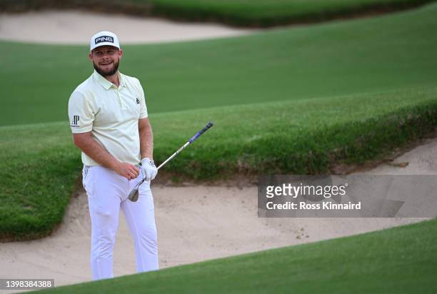 Tyrrell Hatton of England reacts after his bunker shot on the 16th hole during the second round of the 2022 PGA Championship at Southern Hills...