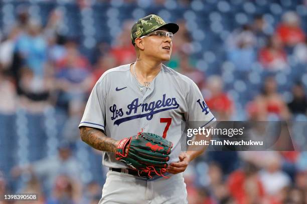 Julio Urias of the Los Angeles Dodgers looks on during the first inning against the Philadelphia Phillies at Citizens Bank Park on May 20, 2022 in...