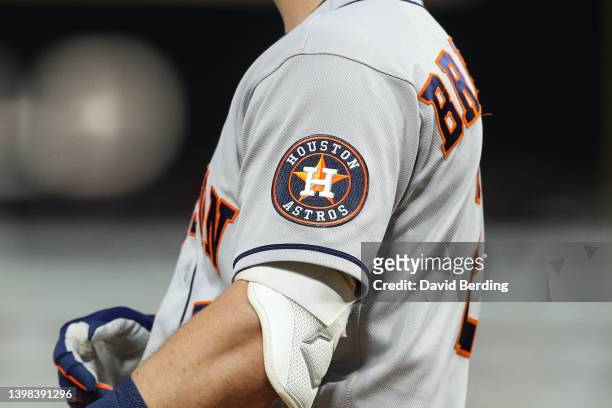 View of the Houston Astros logo on the jersey of Alex Bregman in the third inning of the game against the Minnesota Twins at Target Field on May 11,...
