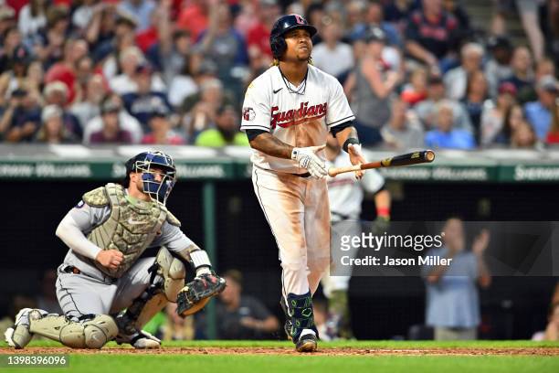 Jose Ramirez of the Cleveland Guardians hits a three-run homer during the sixth inning against the Detroit Tigers at Progressive Field on May 20,...