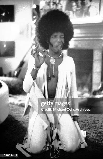Sly Stone of the psychedelic soul group 'Sly & The Family Stone' poses for a portrait sesion at home on September 17, 1972.