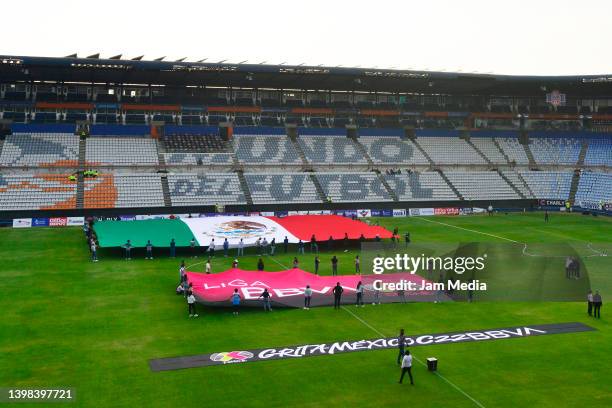 Flags of Mexico, Liga BBVA and Grita Mexico C22 BBVA are deployed at the Hidalgo stadium prior to the final first leg match between Pachuca and...