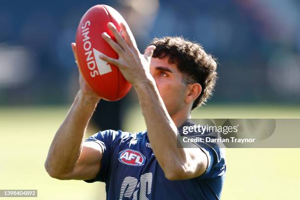 Tyson Stengle of the Cats warms up before the round 10 AFL match between the Geelong Cats and the Port Adelaide Power at GMHBA Stadium on May 21,...