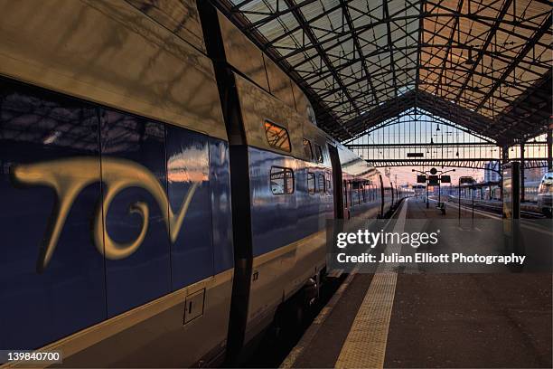 a tgv (train ãâ grand vitesse) awaits departure at tours train station, france. - tgv photos et images de collection