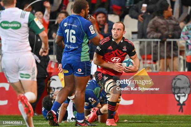 Tom Christie of the Crusaders reacts afteer scoring a try during the round 14 Super Rugby Pacific match between the Crusaders and the Fijian Drua at...