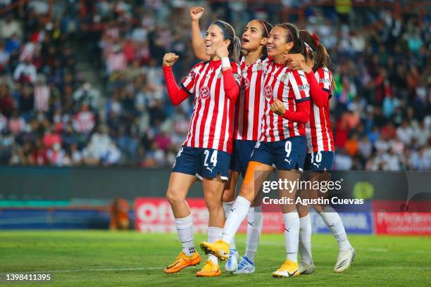 Alicia Cervantes of Chivas celebrates with teammates after scoring her team's fourth goal during the final first leg match between Pachuca and Chivas...