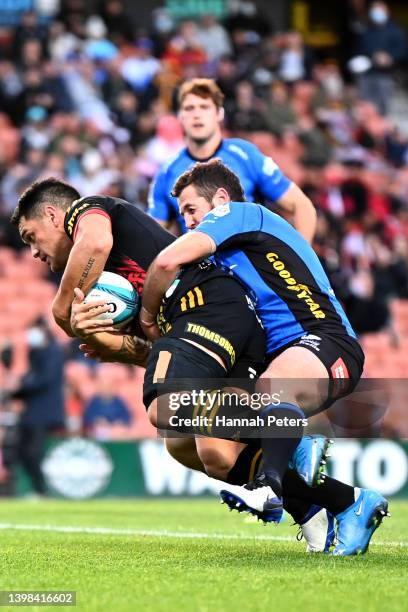 Quinn Tupaea of the Chiefs dives over to score a try during the round 14 Super Rugby Pacific match between the Chiefs and the Western Force at FMG...