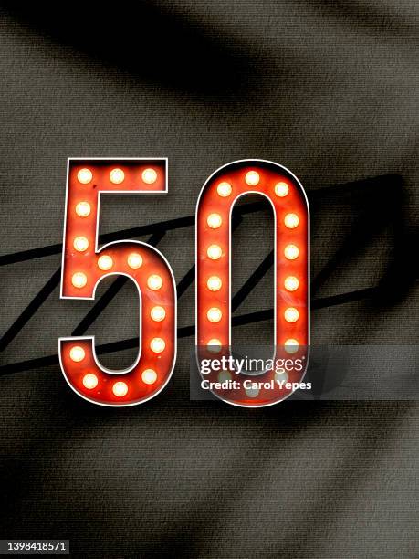 number 50  in red retro light bulb style - number 50 imagens e fotografias de stock