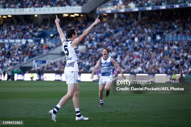 Jeremy Cameron of the Cats celebrates kicking a goal from outside 50 metres on the three quarter time siren during the round 10 AFL match between the...