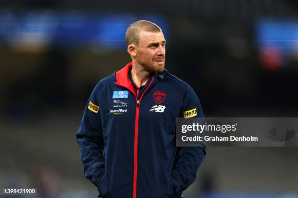 Melbourne Demons Head Coach Simon Goodwin looks on prior to the round 10 AFL match between the North Melbourne Kangaroos and the Melbourne Demons at...