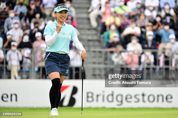 Chie Arimura of Japan celebrates holing out with the birdie on the 18th green during the third round of Bridgestone Ladies Open at Sodegaura Country...