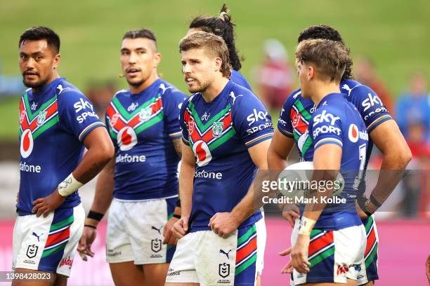 Jack Murchie of the Warriors and his team look dejected after a try during the round 11 NRL match between the St George Illawarra Dragons and the New...
