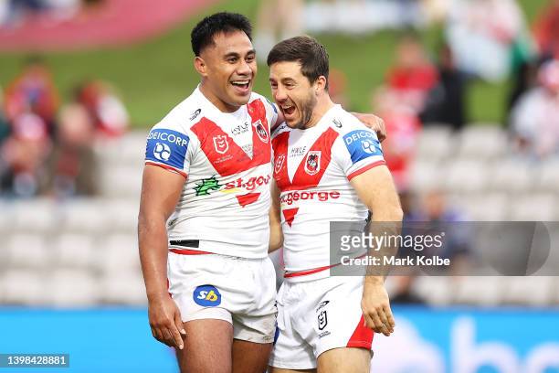 Michael Molo of the Dragons celebrates with Ben Hunt of the Dragons after scoring a try during the round 11 NRL match between the St George Illawarra...