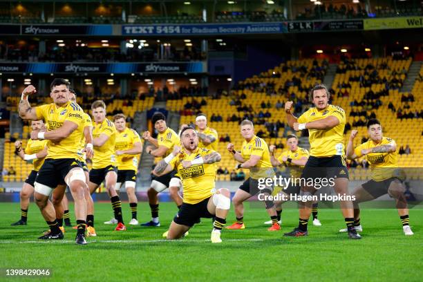 Hurricanes players perform a haka during the round 14 Super Rugby Pacific match between the Hurricanes and the Melbourne Rebels at Sky Stadium on May...