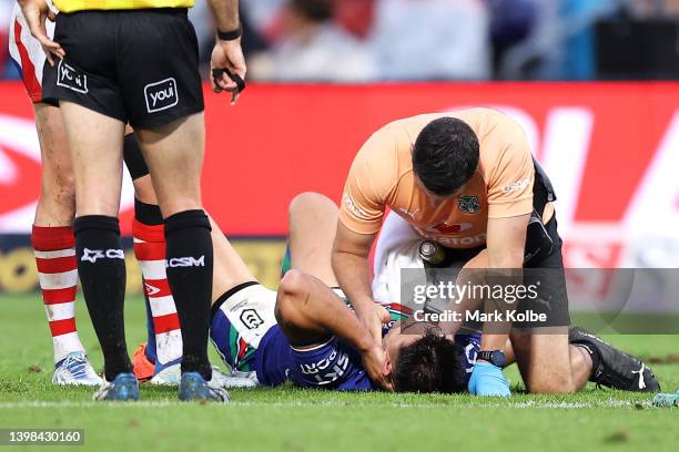 Shaun Johnson of the Warriors receives attention from the trainer during the round 11 NRL match between the St George Illawarra Dragons and the New...