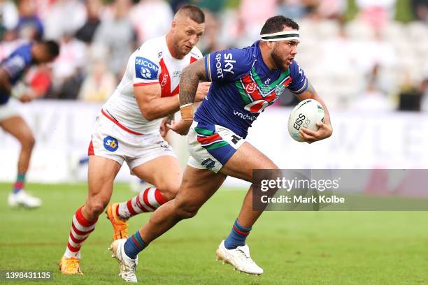 Jazz Tevaga of the Warriors makes a break during the round 11 NRL match between the St George Illawarra Dragons and the New Zealand Warriors at...