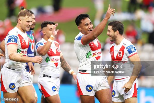 Michael Molo of the Dragons celebrates scoring a try during the round 11 NRL match between the St George Illawarra Dragons and the New Zealand...