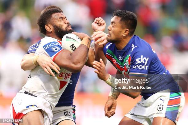 Mikaele Ravalawa of the Dragons is tackled during the round 11 NRL match between the St George Illawarra Dragons and the New Zealand Warriors at...