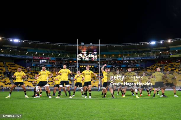 Hurricanes players perform a haka during the round 14 Super Rugby Pacific match between the Hurricanes and the Melbourne Rebels at Sky Stadium on May...