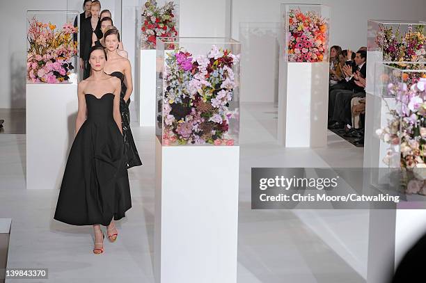 Models walk the runway finale at the Jil Sander Autumn Winter 2012 fashion show during Milan Fashion Week on February 25, 2012 in Milan, Italy.