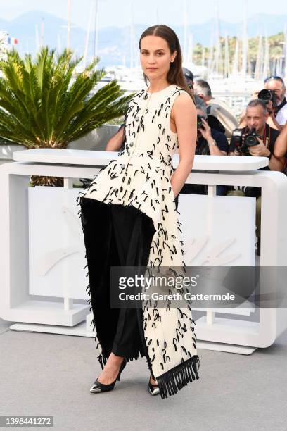 Alicia Vikander attends the photocall for "Irma Vep" during the 75th annual Cannes film festival at Palais des Festivals on May 21, 2022 in Cannes,...