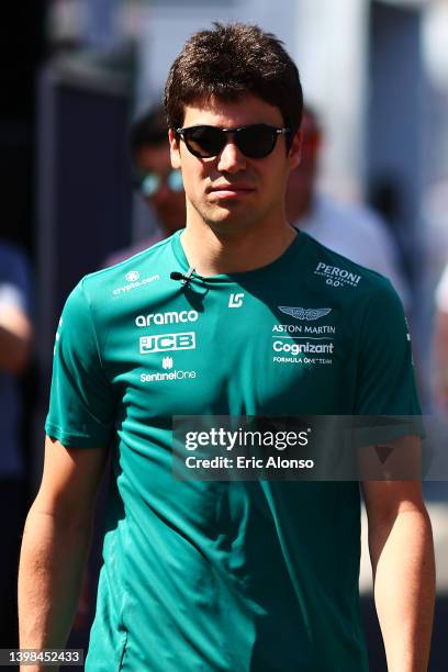 Lance Stroll of Canada and Aston Martin looks on in the paddock ahead of the F1 Grand Prix of Spain at Circuit de Barcelona-Catalunya on May 21, 2022...