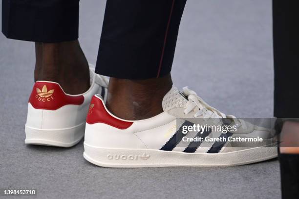 Idris Elba, shoe detail, attends the photocall for "Three Thousand Years Of Longing " during the 75th annual Cannes film festival at Palais des...