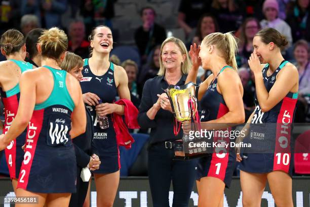 Vixens celebrate winning the Sargeant McKinnis Cup with Simone McKinnis, Head Coach of the Vixens during the round 11 Super Netball match between...