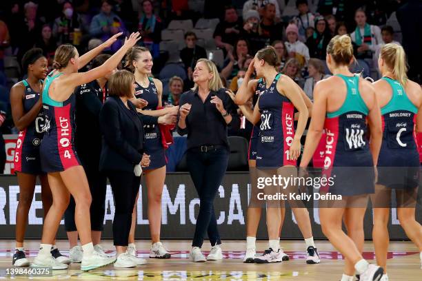 Vixens celebrate winning the Sargeant McKinnis Cup with Simone McKinnis, Head Coach of the Vixens during the round 11 Super Netball match between...