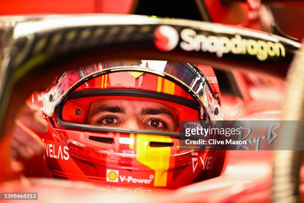 Carlos Sainz of Spain and Ferrari prepares to drive in the garage during practice ahead of the F1 Grand Prix of Spain at Circuit de...