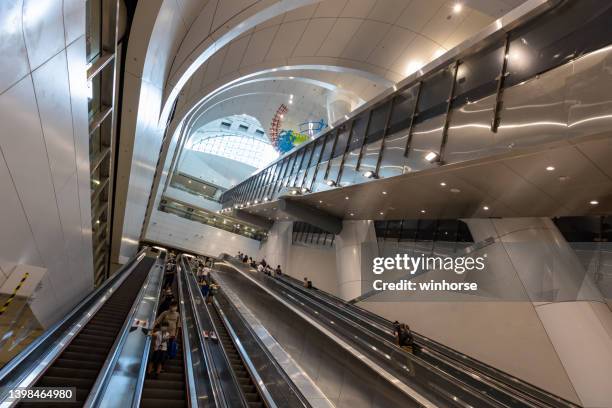 mtr east rail line cross harbour extension at the admiralty station in hong kong - cross railway station stock pictures, royalty-free photos & images