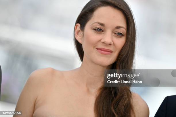 Marion Cotillard attends the photocall for "Brother And Sister " during the 75th annual Cannes film festival at Palais des Festivals on May 21, 2022...