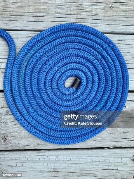 Coiled Rode 53 A Coiled Rope On A Moored Boat Stock Photos, High-Res Pictures, and ...