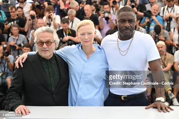 Director George Miller, Tilda Swinton and Idris Elba attend the photocall for "Three Thousand Years Of Longing " during the 75th annual Cannes film...